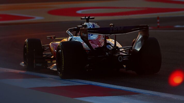 A view from behind of Charles Leclerc driving the Ferrari SF-26 during Bahrain 2026 testing