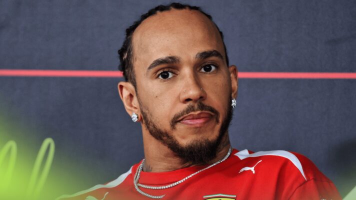 Lewis Hamilton eyes the camera during a press conference