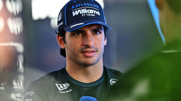 Carlos Sainz interviewed in the paddock