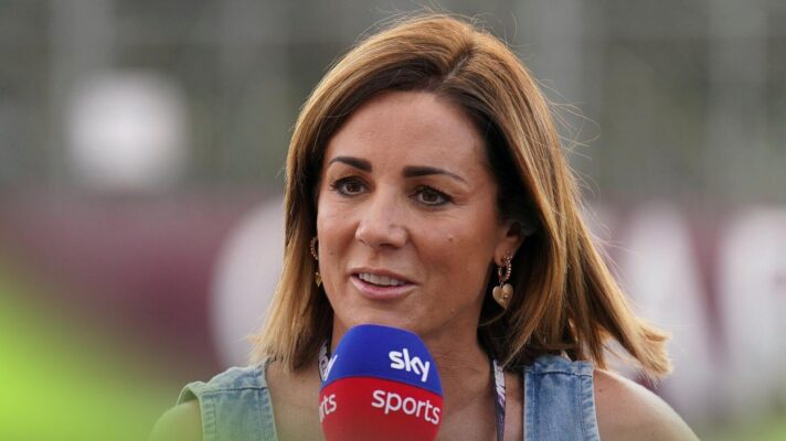Natalie Pinkham holding a Sky Sports microphone.