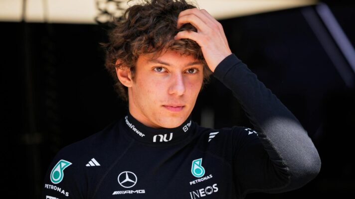 Mercedes driver Kimi Antonelli puts his hand on his head.