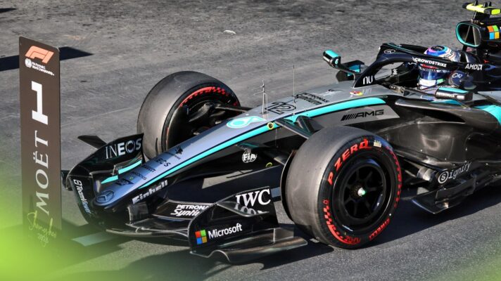 Kimi Antonelli parks in front of the #1 board after qualifying on pole for the Chinese Grand Prix.