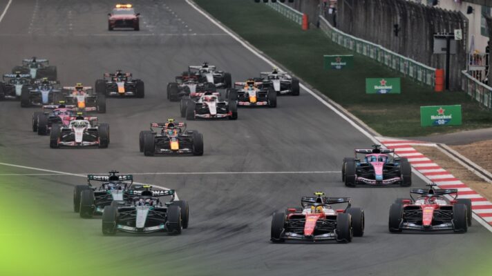 The field heads into Turn 1 at the start of the 2026 Chinese Grand Prix.