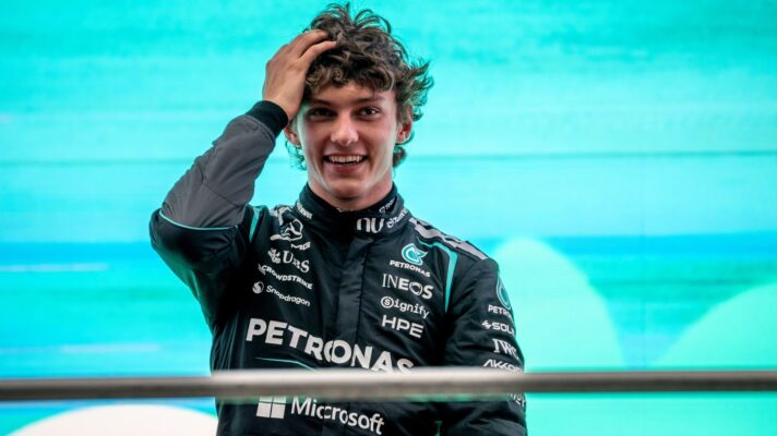 Kimi Antonelli with his hand on his head during the Chinese GP podium ceremony following his first F1 win.