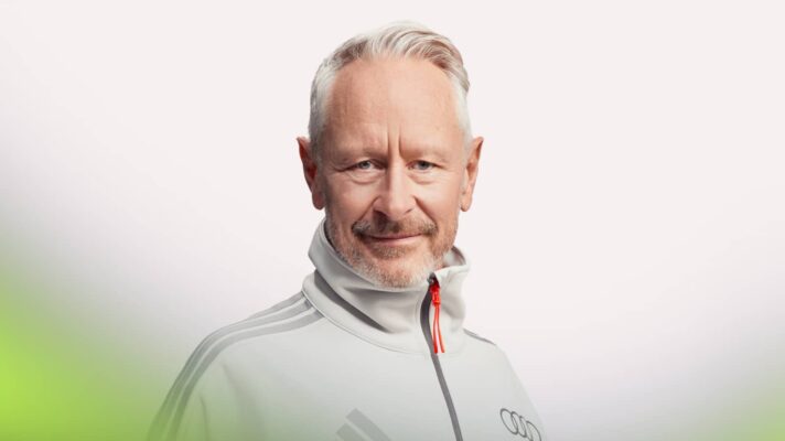 A studio shot of Jonathan Wheatley posing in Audi F1 team kit