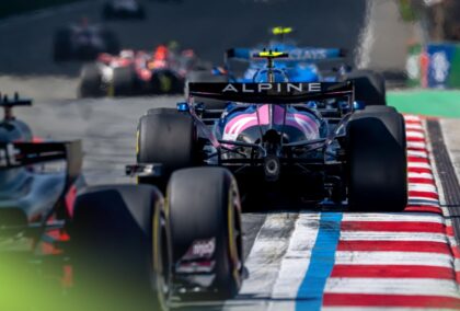 An Alpine races away from the camera down the front straight during the Chinese Grand Prix.
