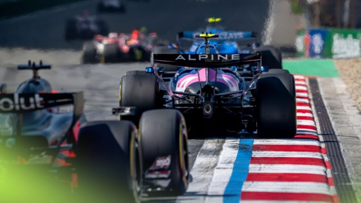 An Alpine races away from the camera down the front straight during the Chinese Grand Prix.