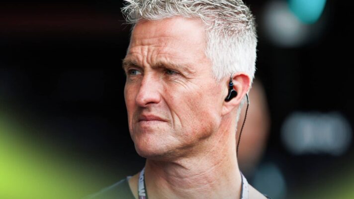 Ralf Schumacher looks on in the F1 pit lane