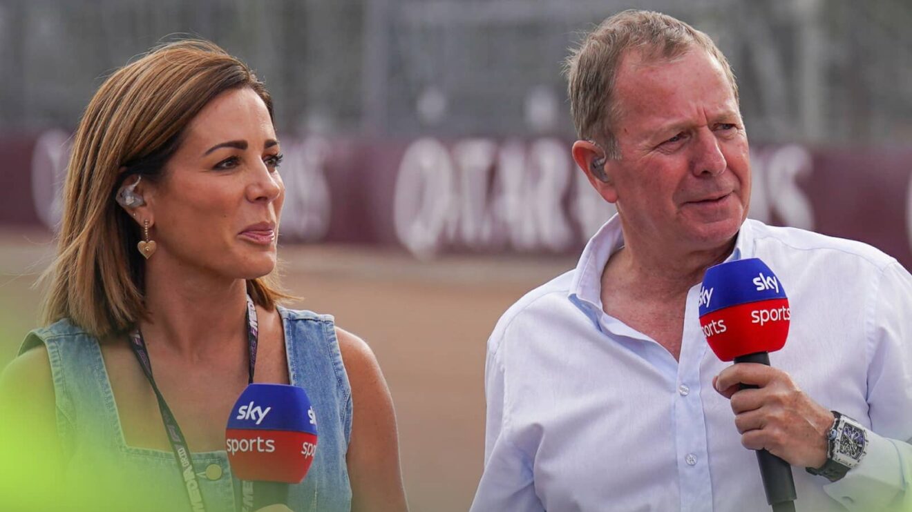 Natalie Pinkham and Martin Brundle holding Sky F1 microphones at Silverstone