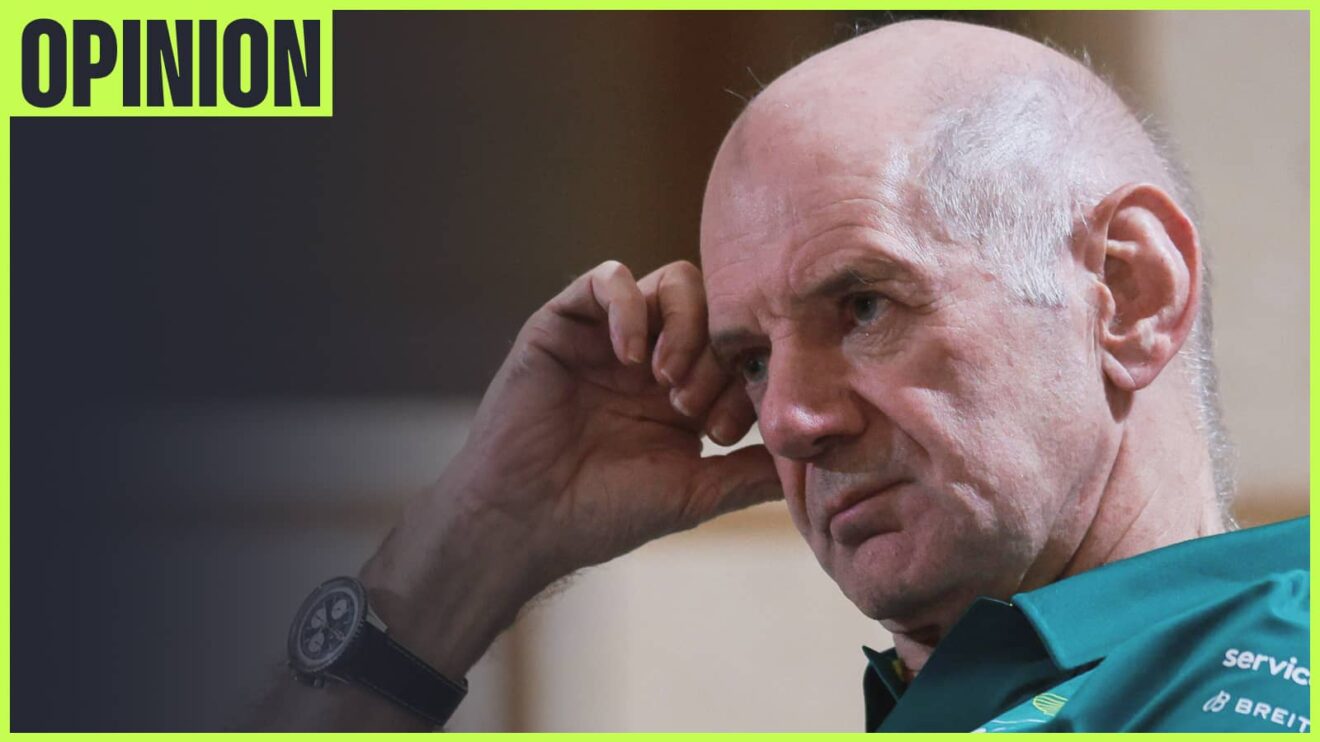 Adrian Newey sits with his hand resting against his head with an 'opinion' tab in the top-left corner