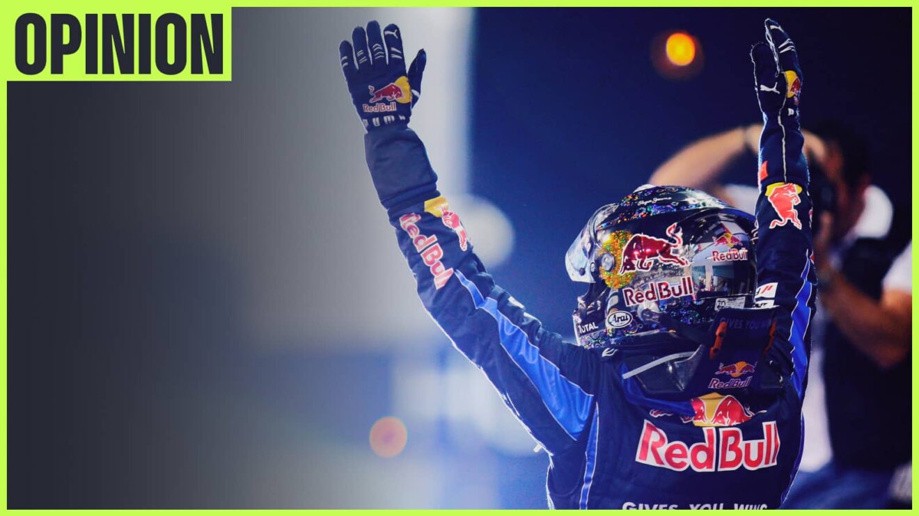 Sebastian Vettel raising his arms in celebration at night in Abu Dhabi with an 'opinion' tab in the top-left corner