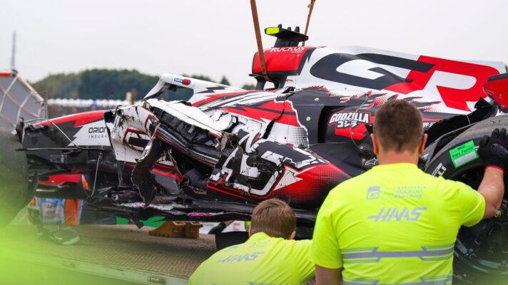 Oliver Bearman's heavily damaged Haas is lifted off a recovery truck following his Japanese GP crash.