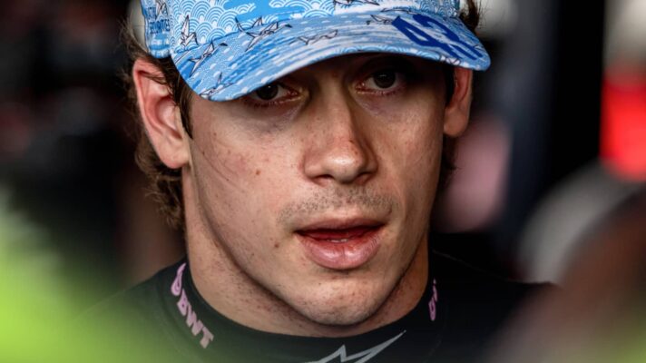 A close-up shot of Franco Colapinto speaking to the media