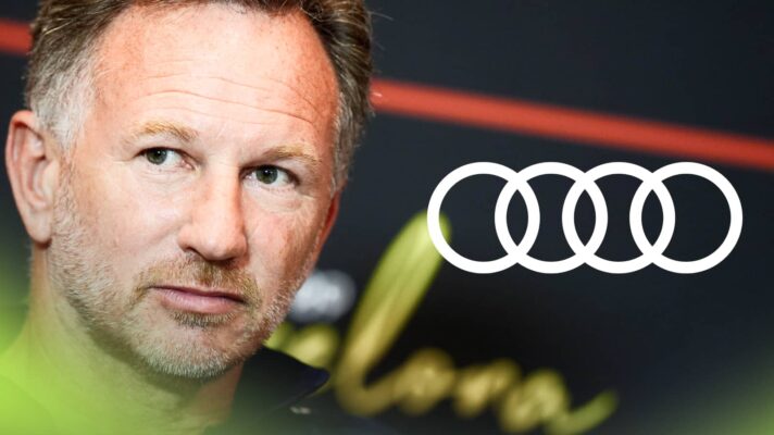 Christian Horner looks on in a press conference with an Audi logo alongside him