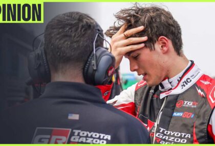 Haas driver Oliver Bearman talks to his engineer on the grid at Suzuka.