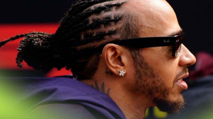 A side-angle shot of Ferrari driver Lewis Hamilton at the 2026 Chinese Grand Prix