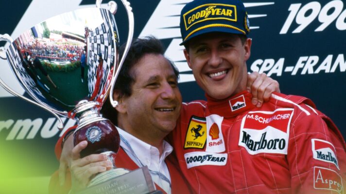 Ferrari's Michael Schumacher and Jean Todt celebrate on the Belgium 1997 podium