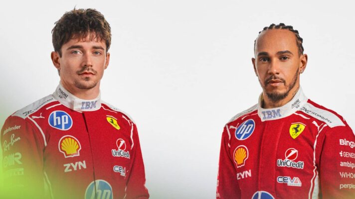 A studio-based shot of Charles Leclerc and Lewis Hamilton posing in 2026 Ferrari overalls