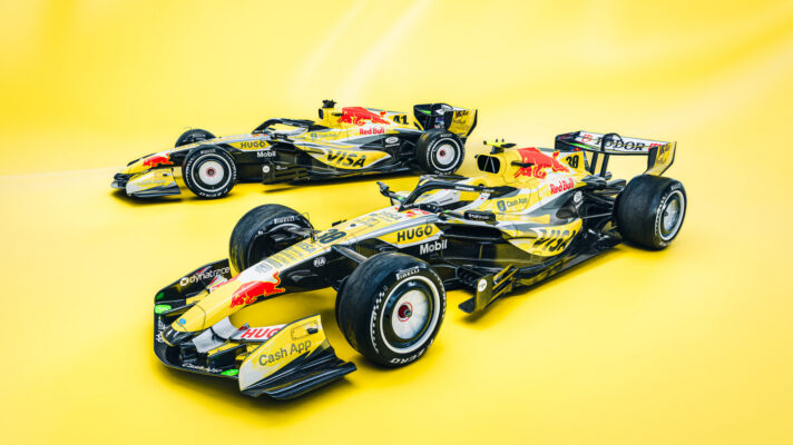 A digital render of the yellow Racing Bulls livery with two cars showing a front three-quarter look to the camera.