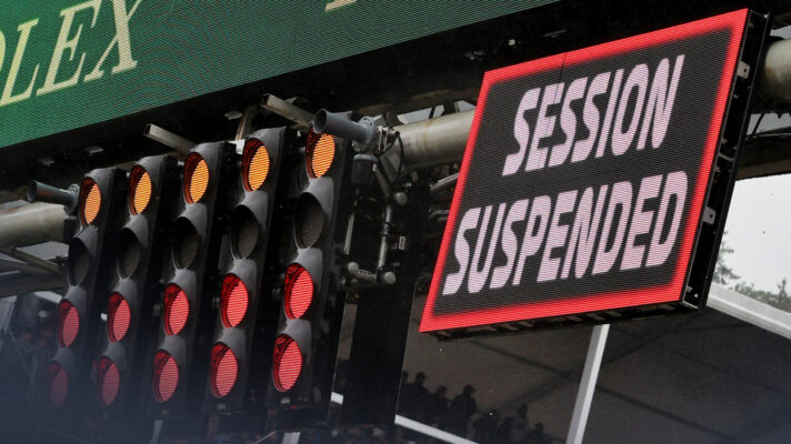 A close up shot of the light gantry showing red lights and the Session Suspended message.