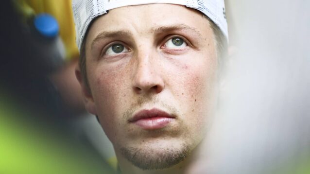 A close-up shot of Liam Lawson with his cap on back to front
