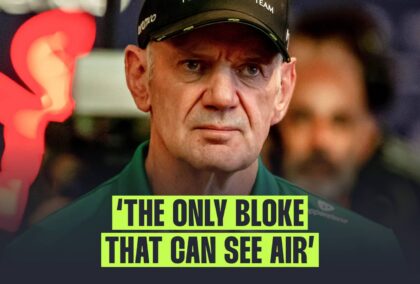 Adrian Newey looks on with a banner reading: 'The only bloke that can see air'
