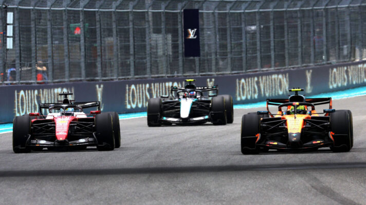 Charles Leclerc racing Lando Norris
