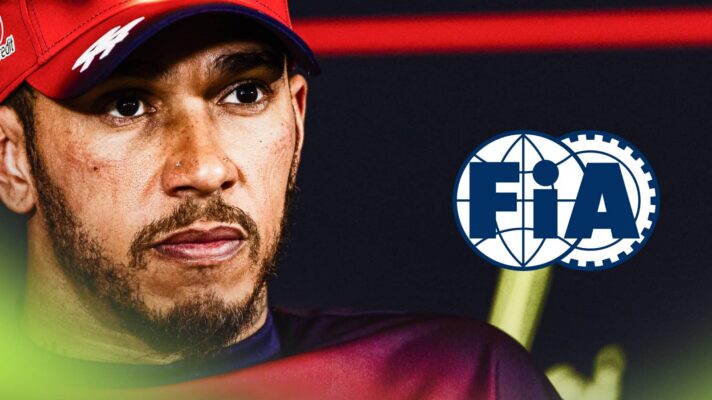 A close-up shot of Lewis Hamilton in a press conference with an FIA logo alongside him