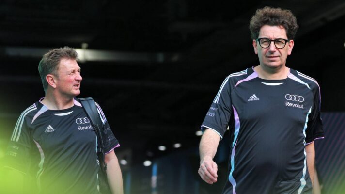Audi's Allan McNish and Mattia Binotto at the 2026 Miami Grand Prix.