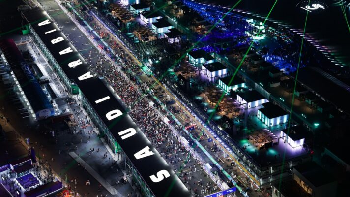 An aerial shot of the Jeddah Corniche circuit ahead of the Saudi Arabian GP with the grid filled with people.
