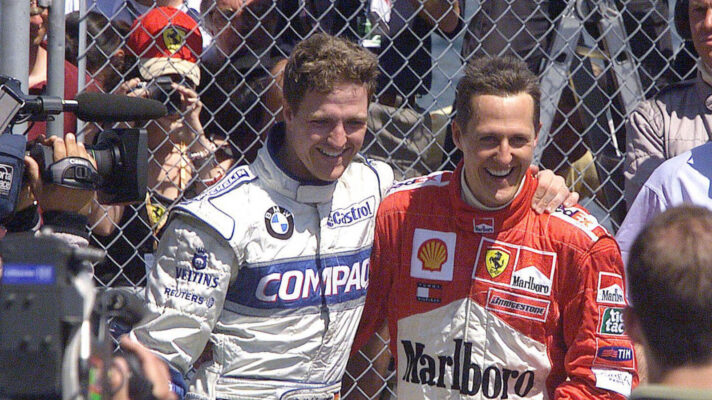 Ralf Schumacher with his arm around Michael in a 1-2 celebration at the 2001 Canadian GP