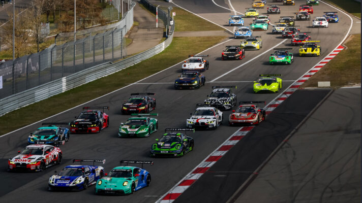A field of GT3 car races into the first corner at the Nurburgring 24 Hours.