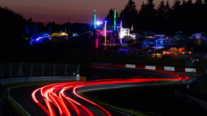 Light trails on the Nordschleife as darkness falls on the Nürburgring 24 Hours