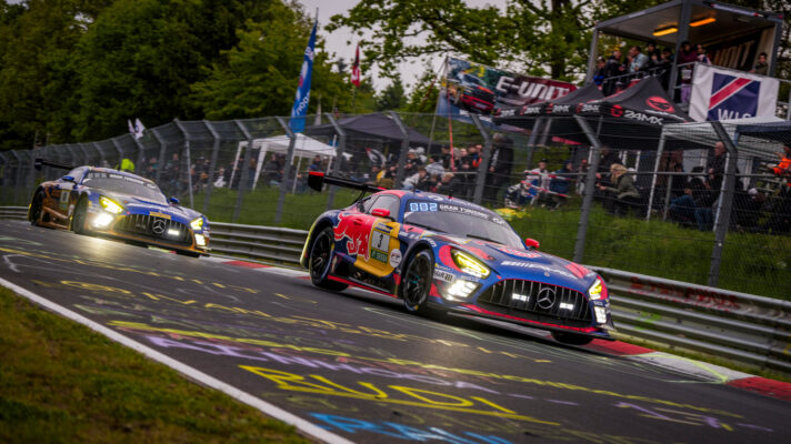 Max Verstappen on track at the Nürburgring 24 Hours being pursued by Maro Engel in a Mercedes-AMG-GT3.