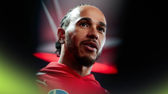 Lewis Hamilton speaks to the media