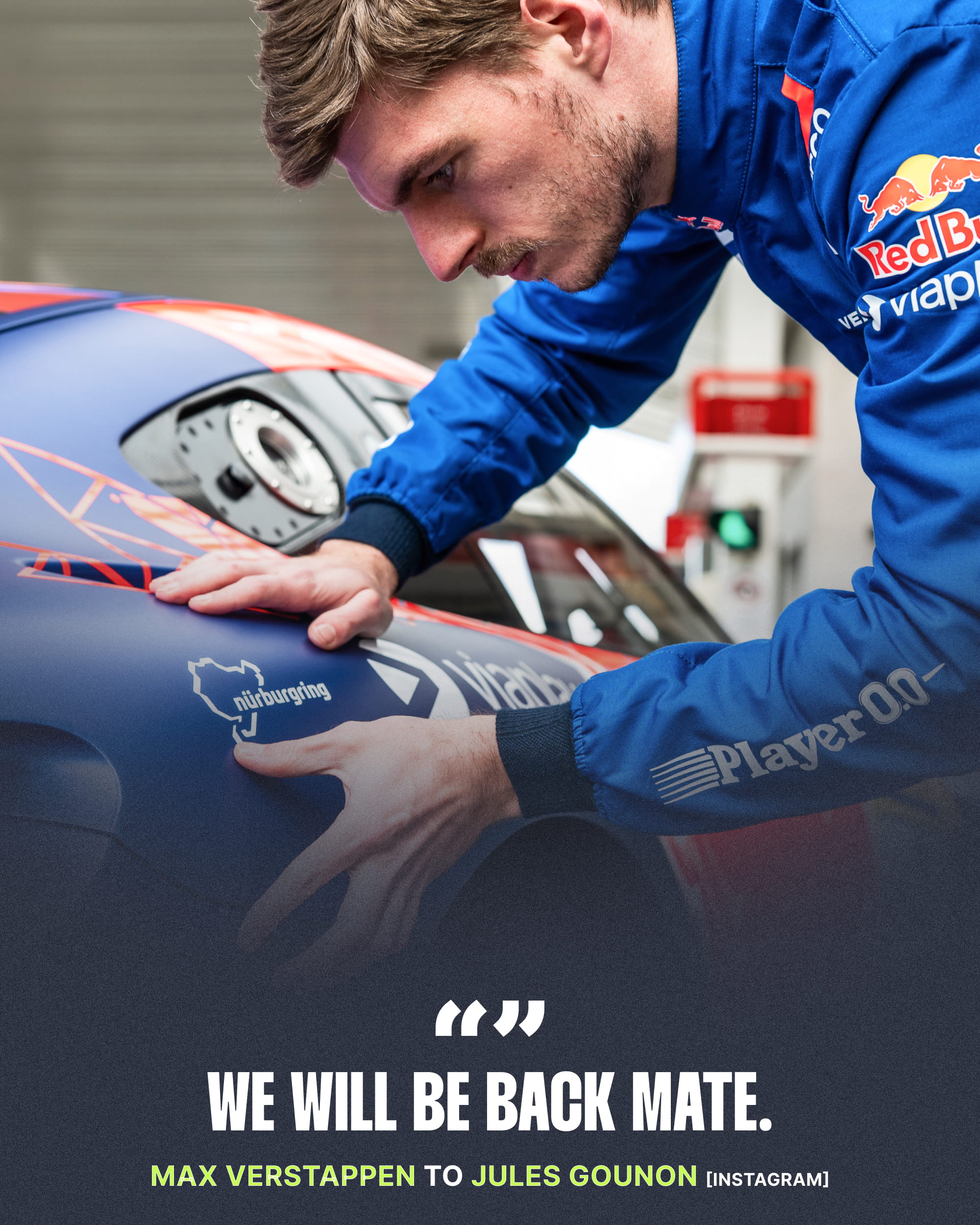 Max Verstappen applying a Nürburgring sticker to his car
