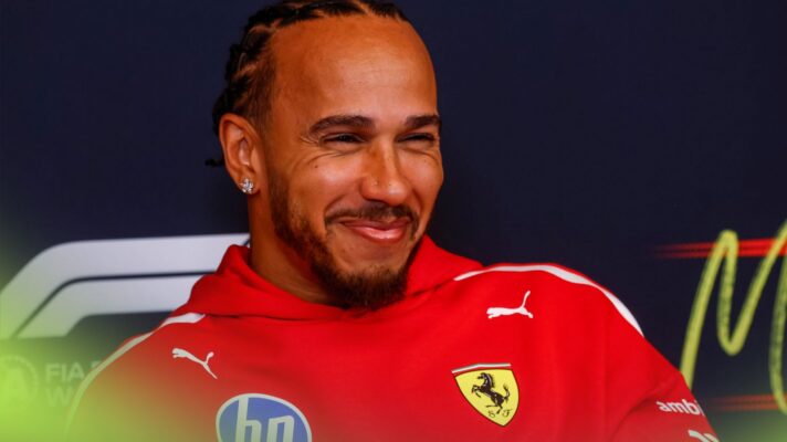 Ferrari driver Lewis Hamilton smiling in a 2026 Canadian GP press conference