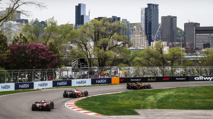 Cars on the Circuit Gilles Villeneuve with the Montreal skyline in the background as part of the Canadian Grand Prix.