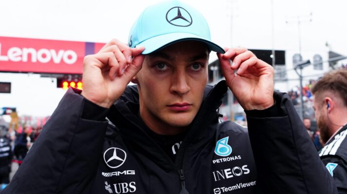 Mercedes driver George Russell adjusts his cap at the 2026 Canadian Grand Prix