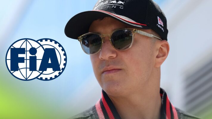 Isack Hadjar, Red Bull, pictured at the 2026 Canadian Grand Prix, as an FIA logo appears on the left
