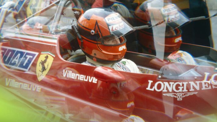 Gilles Villeneuve sat in a Ferrari cockpit with his helmet on, 1982.