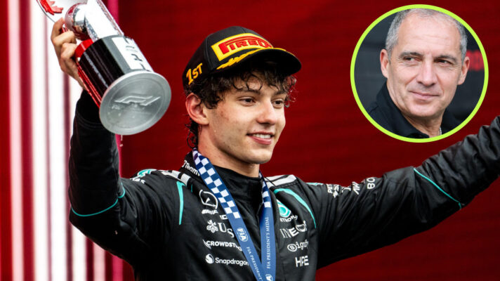 Kimi Antonelli on the podium with his arms raised and trophy in hand, his father Marco Antonelli in the circle