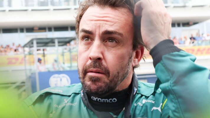 Fernando Alonso looks to the sky on the grid in Miami