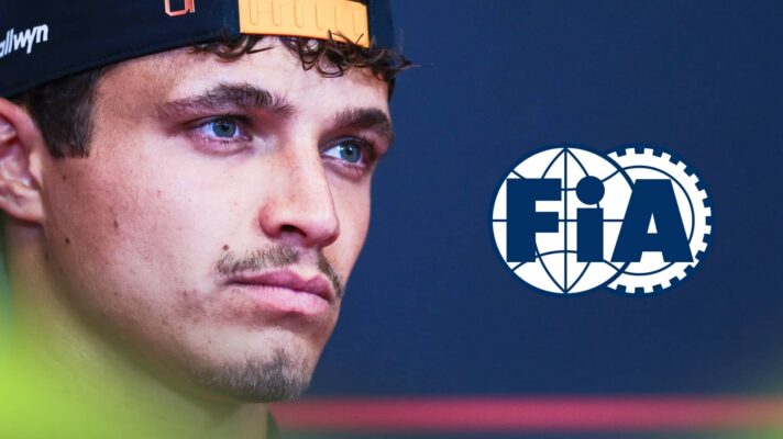 A close-up shot of Lando Norris in a press conference with a prominent FIA logo alongside him