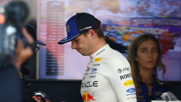 Max Verstappen walking past the cameraman with his head down after his Monaco DNF