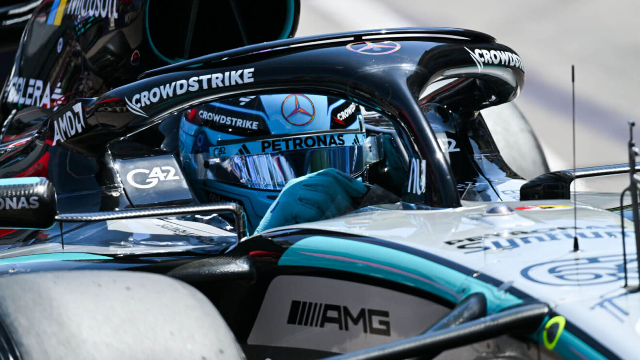 George Russell up close in the Mercedes W17, hands on steering wheel