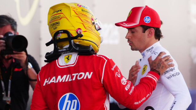 Lewis Hamilton hand on Charles Leclerc shoulder, photographer in the background