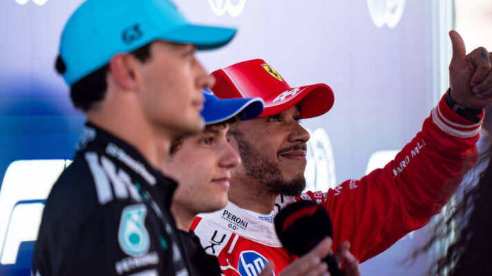 Lewis Hamilton in a post qualifying interview with his thumb up, George Russell and Kimi Antonelli