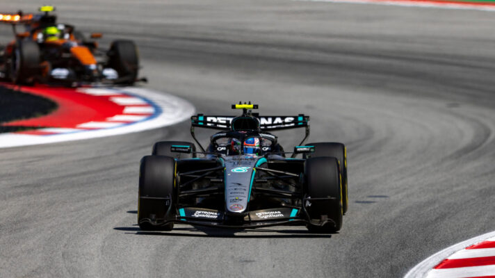 Kimi Antonelli running ahead of Lando Norris at the Barcelona Grand Prix