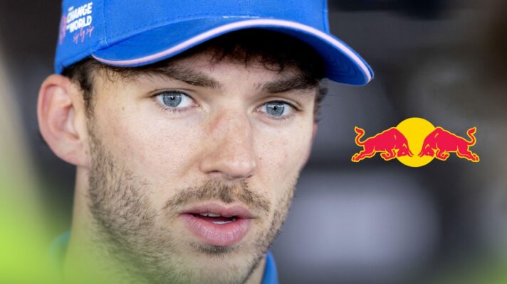 Pierre Gasly, Alpine, pictured at the 2026 Barcelona-Catalunya Grand Prix as a Red Bull logo appears on the right
